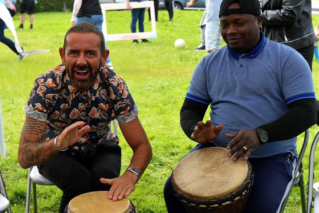 Mickey Doherty takes part in a drumming session at the NW Migrants Forum’s ‘Celebrate Family – Connect Communities’ fun day at Coshquin on Sunday afternoon last. Photo: George Sweeney.  DER2320GS – 22