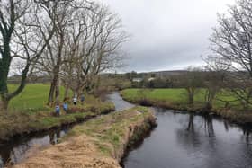 Inishowen River Trust Volunteers tree planting along the Culdaff River.