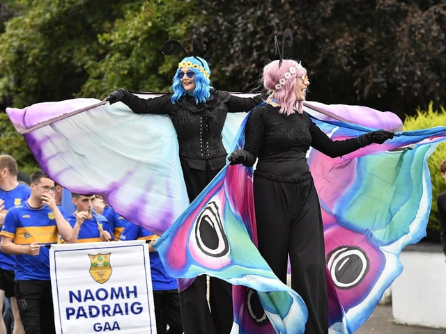 Muff Feile opening parade makes its way through the village on Friday evening. Photo: George Sweeney