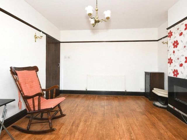 The rocking chair gives the game away. The sitting room is very much a space in which to relax.