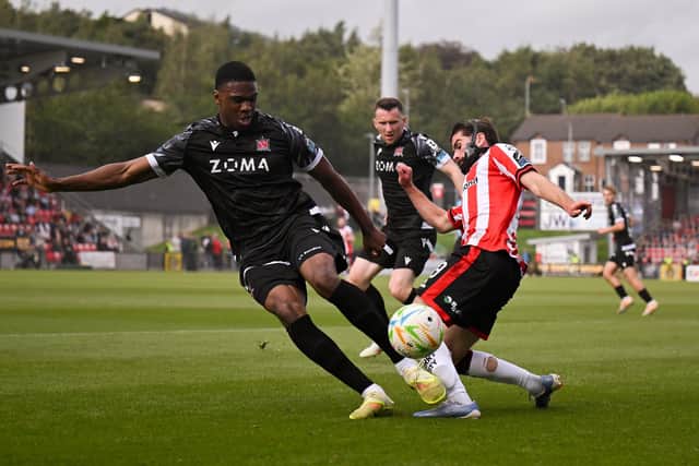 Brandon Fleming is tackled by Mayowa Animasahun of Dundalk during the Club Orange Men’s FAI Cup quarter-final match between Derry City and Dundalk at The Ryan McBride Brandywell Stadium in Derry. Photo by Ben McShane/Sportsfile