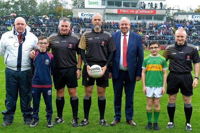 Young footballers from Slaughtneil and Watty Graham’s, Glen presented the match ball to referee Gavin Hegarty prior to Sunday’s SFC final as part of GAA’s Referee Respect Day, Included in the picture is Derry County Chairman John Keenan and match officials. Photo: George Sweeney.  DER2243GS – 009