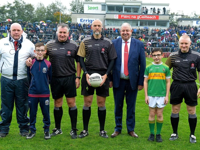 Young footballers from Slaughtneil and Watty Graham’s, Glen presented the match ball to referee Gavin Hegarty prior to Sunday’s SFC final as part of GAA’s Referee Respect Day, Included in the picture is Derry County Chairman John Keenan and match officials. Photo: George Sweeney. DER2243GS – 009