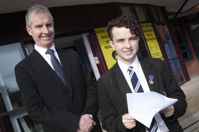DUBLIN-BOUND. . . . .St. Columb’s College student Patrick Quigley who addressed Seanad Éireann pictured with his Principal, Mr. Finbar Madden.