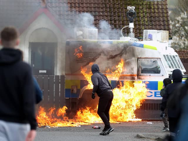 Youths throw petrol bombs at a PSNI vehicle ahead of a republican Easter parade in Creggan on Easter Monday. Picture date: Monday April 10, 2023.