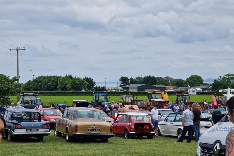 Checking out the some of the vintage cars and tractors.