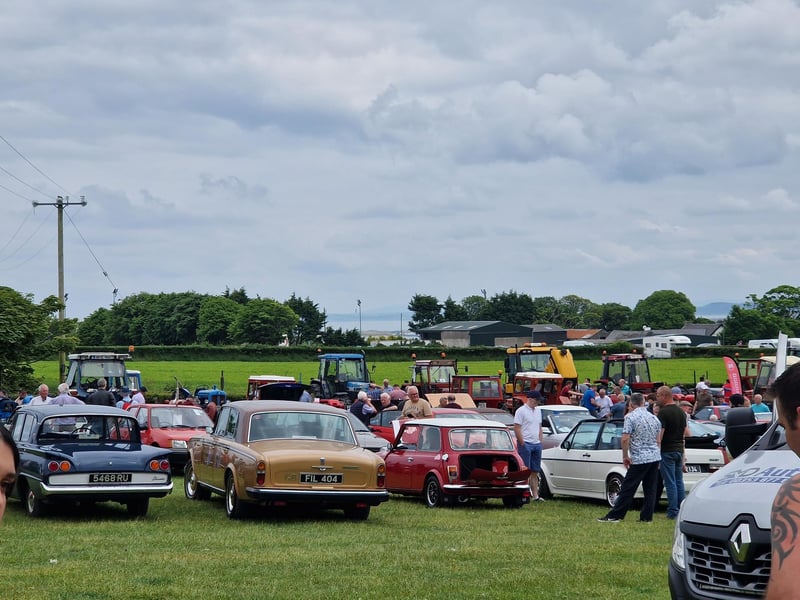 Checking out the some of the vintage cars and tractors.