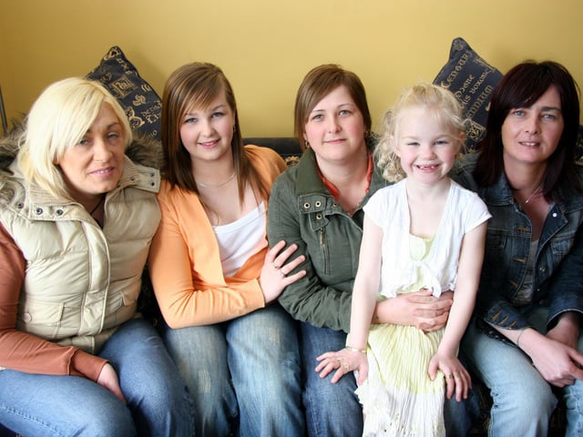 Megan smiles for the camera with aunts, Lorraine,Shauna,Patricia,Melissa at her 7th birthday party.0012JML : Parties in Derry in Spring 2006.
