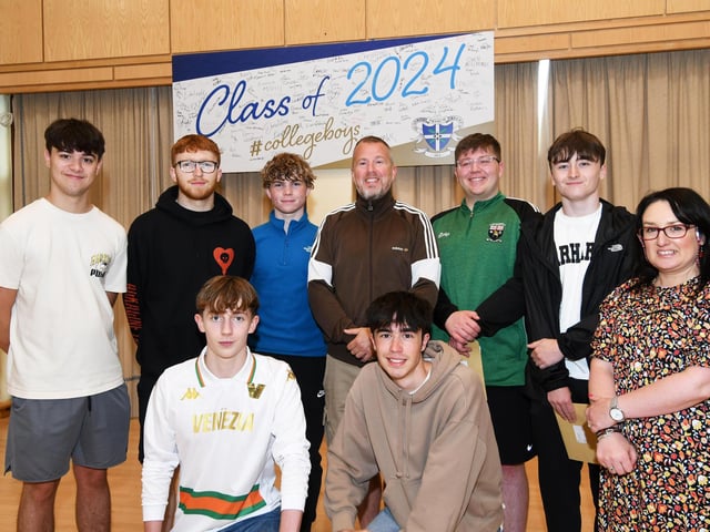 Caroline McLaughlin, Principal, and Michael McLaughlin, Head of Year 13, pictured with some of the high achievers at St. Columb's College on Thursday morning.