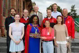 Mayor of Derry, Councillor Lilian Seenoi Barr, presenting a civic gift to Gemma Thompson, City of Derry Spartans Athletic Club, at in reception in the Guildhall following her recent success in winning two medals at the European Masters Indoor Championships in Poland. Gemma won the medals in the 200m and 60m setting an Irish Record. Included are fellow Spartans. (Photo: Lorcan Doherty)Photo Lorcan Doherty