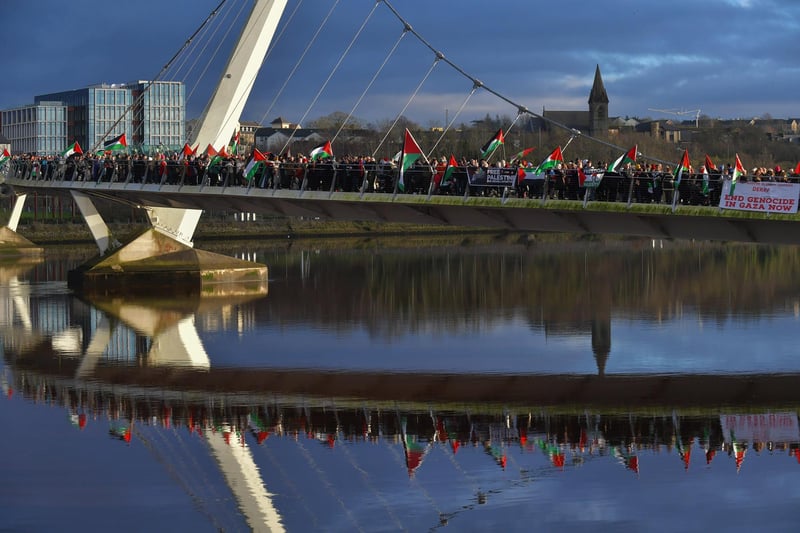 Hundreds of people gather on Derry’s Peace Bridge, on Sunday afternoon, in solidarity with Gaza and Palestinians. Photo: George Sweeney.
