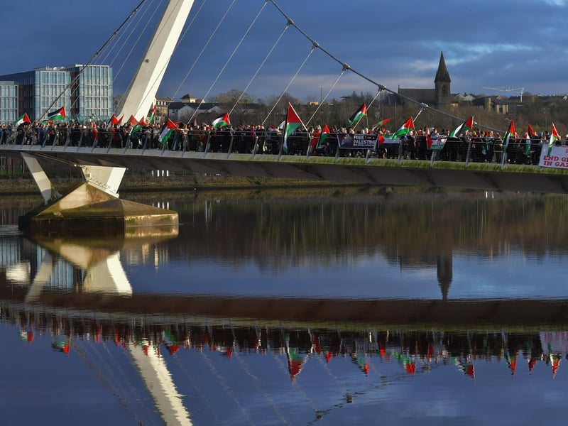 Hundreds of people gather on Derry’s Peace Bridge, on Sunday afternoon, in solidarity with Gaza and Palestinians. Photo: George Sweeney.