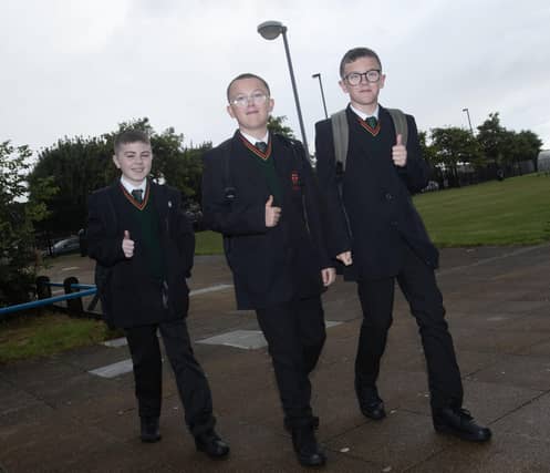 Thumbs up from these three Year 8 starts at St. Joseph's Boys School on Friday. (Photos: Jim McCafferty Photography)