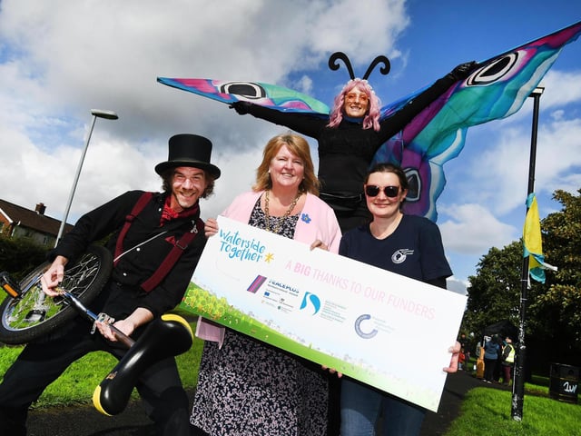 The Deputy Mayor of Derry City and Strabane District Council, Niree McMorris pictured at Saturday's Waterside Together Mini Festival. Included are some of the characters from the In Your Space Circus. : .
