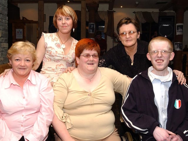 Francis Saunders with her son Alan at her 40th birthday party in the Three Flowers bar, with her friends Rosemary Martin, Louise Saunders and Barbara Merrigan. (1103CG15) :.