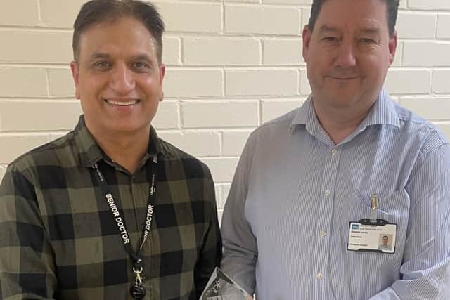 Dr. Mukesh Chuch with Dr. Brendan Lavery, Medical Director at the Western Trust