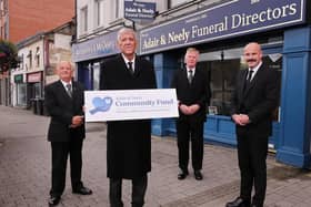 Funeral Manager Wayne Glenn (centre left) with Adair & Neely staff at their new premises.