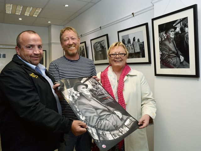 Jim Collins, centre, exhibition curator, pictured with John White and Julie Doherty, of Camerawork, the opening in the Eden Arts Centre, Pilots Row, of the exhibition 'Days Like These' a photgraphic snapshot of the 1980's drawn from the archives of Camerawork Darkrooms, Derry. The exhibition will run unitil the 19th of June. DER2314-142KM