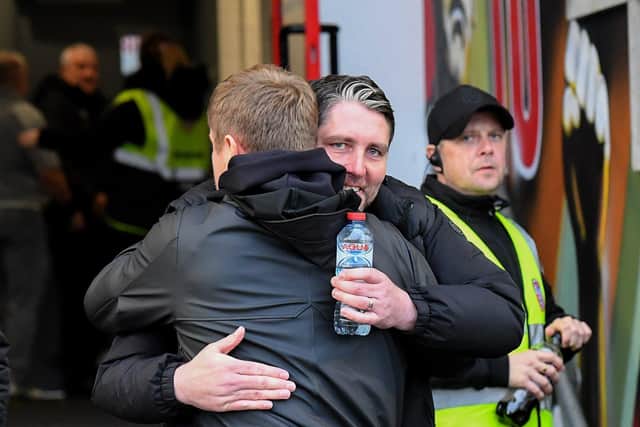 NO BAD BLOOD . . . Derry City manager Ruaidhri Higgins greets Shelbourne boss Damien Duff. Photograph: George Sweeney
