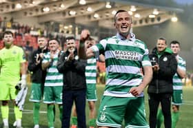 Shamrock Rovers goal hero Aaron McEneff celebrates in front of the visiting supporters at the end of the match. Photographs by Kevin Morrison.