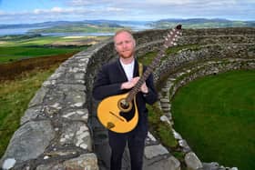 Derry musician Marty Coyle sets his sights on India.  Marty will take to the stage at one of the largest folk festivals in the world this weekend – The Jodhpur RIFF festival in Rajasthan.  The show – Citadels of the Sun - is supported by the British Council and is based around the narratives of two forts - the festival’s famous Mehrangarh Fort and the An Grianan of Aileach fort in Donegal and will blend the traditional folk music of Ireland with that of Rajasthan.  Marty is pictured at Greenan Fort, a hillfort atop the 244 metres high Greenan Mountain at Inishowen.