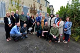 Group pictured at the commencement of the refurbishment of Victoria Hall, Culmore Point, as a multi-service community centre and hub in 2019. Included in the picture is Edward Montgomery, from The Honourable The Irish Society, owners of the property, Cathal Crumley, Secretary, Culmore Community Partnership, Colr Michaela Boyle, Mayor of Derry and Strabane, Neil Doherty, Chairperson, Culmore Community Partnership, contractors, representatives of Derry and Strabane Rural Partnership and local councillors. DER2519GS-005