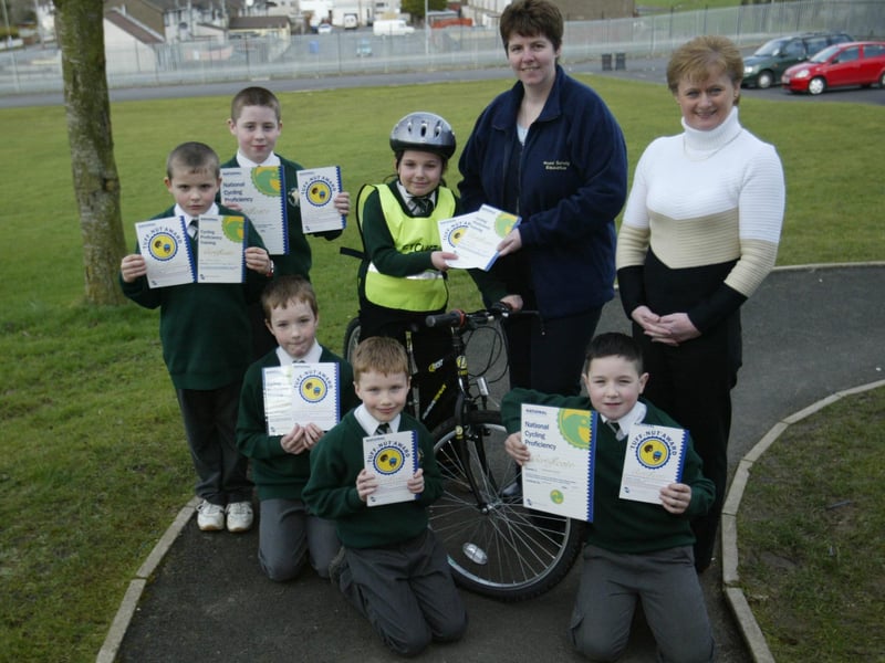 Cycling proficiency certificates recipients from St. Columba's PS pictured with Road Safety Officer Heather Douglas and staff members Eileen Kelly. In photo are pupils (kneeling) Barry Doherty, Connor McDowell and Thomas McLaughlin, while standing are Colin Coyle, Emmet McDaid and Holly Morris.