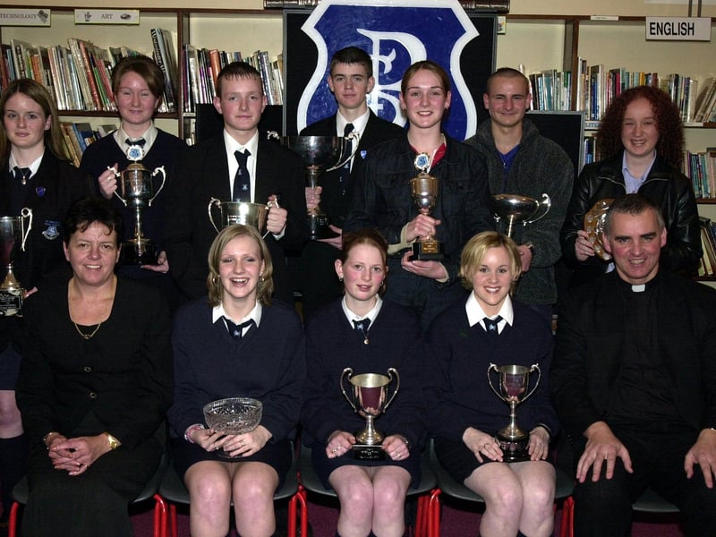 Councillor Lynn Fleming, Board of Governors, and Fr. Michael Canny, C.C., Waterside, pictured with subject prizewinners. Included at front are Deborah McFadden (English), Gemma Tracey (R.E.), and Aisling Morrison (History). Back, from left, are Lisa Kelly (Business Studies), Eileen McConomy (Drama), George Keddy (GNVQ ICT), Martin Starrett (GNVQ Manufacturing), Tracey McCay (Irish), Kevin McCann (Art and Design) and Michaela Clift (Geography). (1/12/CD13) : Pictured are students, staff and invited guests at the annual school prize-giving at St Brecan's High School, Top of the Hill back in the year 2000.