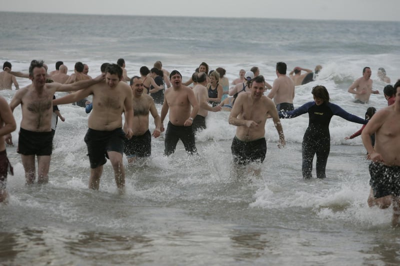 New year day swimmers at Warren Beach, Culdaff, Co. Donegal braved the atrocious weather in aid of Alzheimers Society. pic. Joe Boland : Dozens of fearless New Year’s Day dippers dive into the North Atlantic at Culdaff as part of the annual festive tradition in 2005.