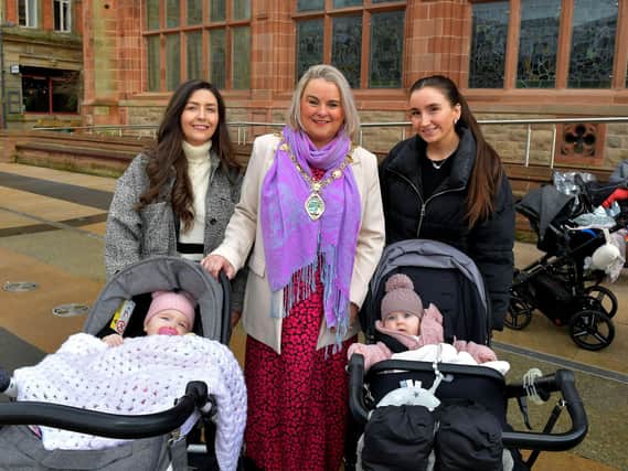 Aideen Kinsella, Saoirse Peoples and babies Aoibh and Raya pictured with Mayor Sandra Duffy at the North West BAPS project gathering in Guildhall Square on Wednesday to mark World Best Feeding in Public Day. Photo: George Sweeney. DER2308GS – 83