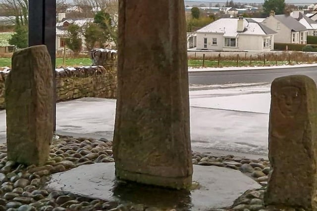 The pillars and base of the cross.