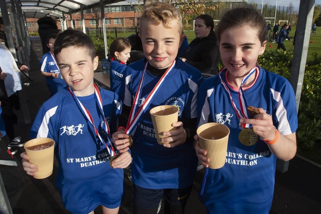 Hot chocolate and biscuits the order of the day on Wednesday for Faughanvale PS pupils Kain, James and Grace.