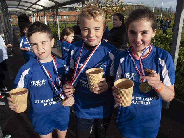 Hot chocolate and biscuits the order of the day on Wednesday for Faughanvale PS pupils Kain, James and Grace.