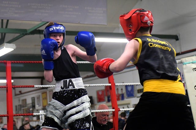 Oakleaf’s Joshua Cairns, left, boxing Clonmany’s Liam Weatherall.  Photo: George Sweeney