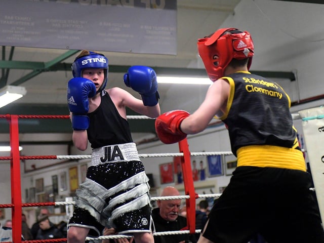 Oakleaf’s Joshua Cairns, left, boxing Clonmany’s Liam Weatherall. Photo: George Sweeney