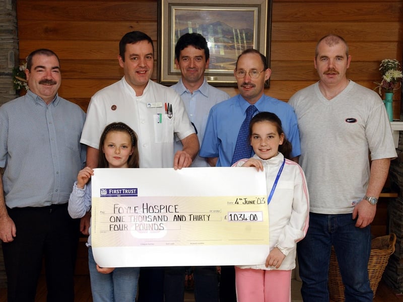 Group presenting a cheque of £1,034 to Tommy Kelly, staff nurse, Foyle Hospice. Included, from left, Jim Harte, Eimear Harte, John White, Joe McFadden, Natasha Deery and Paul Deery.
