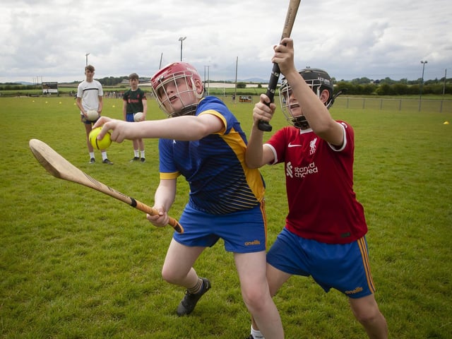 Daniel Walker and Shea Boyle compete for the sliothar at Burt Skills Day. (Photos: Jim McCafferty Photography)