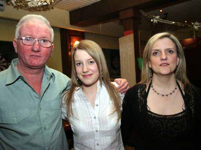 Catherine pictured with her mum Deirdre, dad Jim on the occasion of her 18th birthday. 0028/JML.