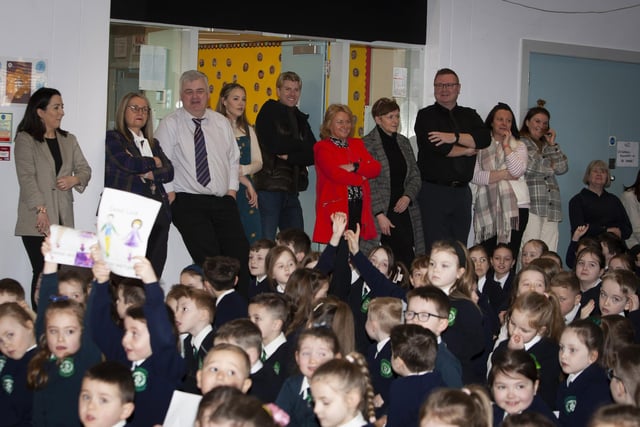 Staff at St Patrick’s PS join in the fun during Damian McGinty’s visit to the school on Tuesday morning.
