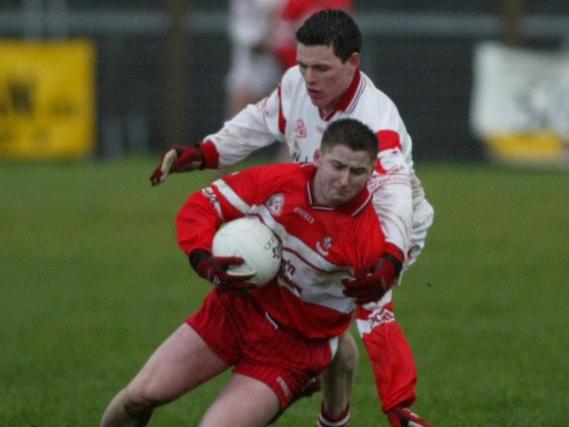 Derry forward Conleth Gilligan is brought to ground during the McKenna Cup meeting in Healy park back in January 2004.