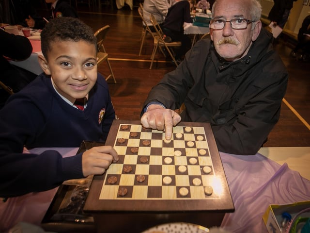 Grandad David McCleery and grandson Jordan having a game of chess on Wednesday. : .