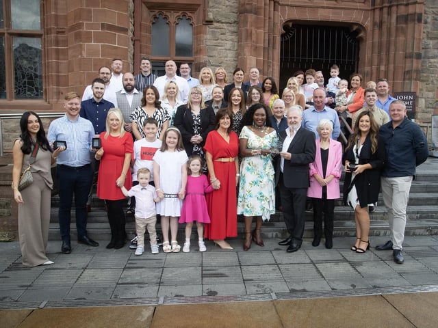 The Mayor of Derry City and Strabane District Council, Lillian Seenoi-Barr pictured at the Guildhall on Wednesday evening making a presentation to Seamus and Marie Nealis, founders of Craft Training, in recognition of their dedicated service and contribution to providing training qualifications in the city and district over many years. Included are family members and staff from Craft Training. (Photos: Jim McCafferty Photography)