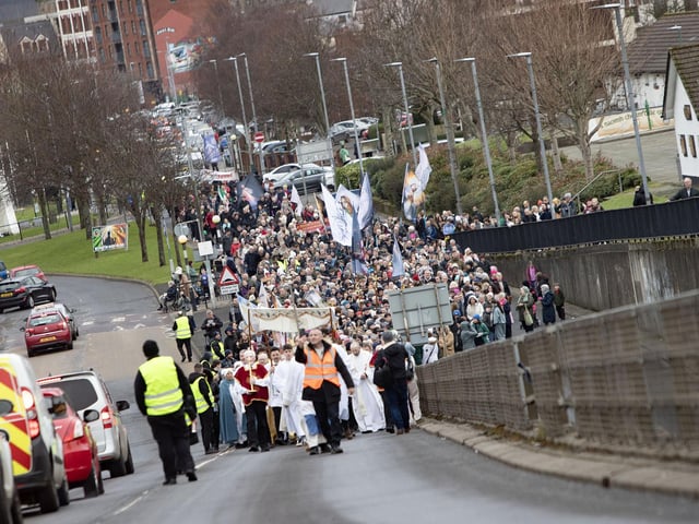 Saturday's Procession makes its way along Rossville Street and up the Lecky Road Flyover before returning to the Long Tower Church for Mass on Saturday. (Photos: Jim McCafferty Photography)