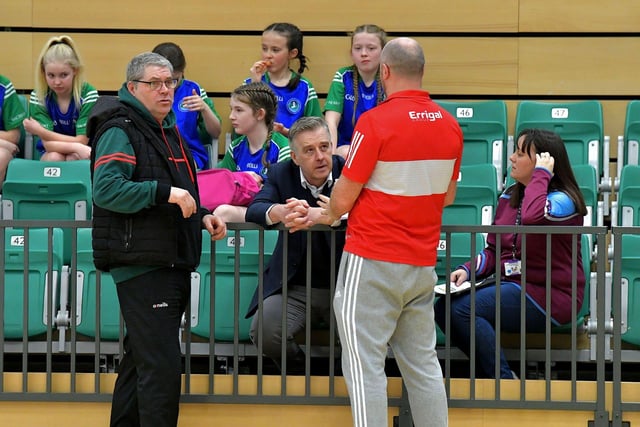 The 'VAR' team in a prolonged discussion at the Derry City Primary School Girls’ Indoor Gaelic Finals Day in Foyle Arena. Photo: George Sweeney. DER2308GS –126
