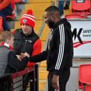 Former Derry City striker James Akintunde chats with fans at the Brandywell. Photo: George Sweeney.  DER2315GS – 114