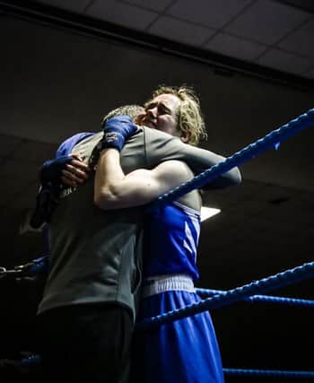 Joy for Carleigh Irvine as she embraces her delighted coach Eugene 'Budge' O'Kane.
