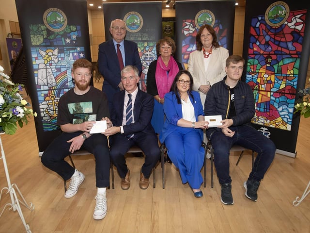Top Academic Achievement Prizewinners 4 Grade A/A* at A level - Christian Kelly and Ben Houston receiving their awards from Mr Niall Downey, Guest Speaker and Mrs C McLaughlin, Principal, at Thursday's St. Columb's College Prizegiving. At back are Mr. P. Kelly, Ms M Hamilton and Mrs G Canavan board of governors.