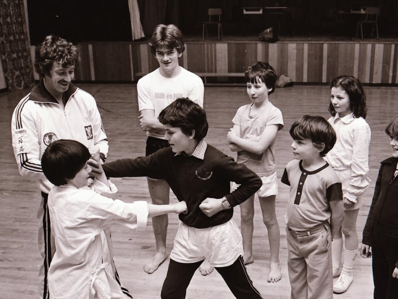 Young members of St. Joseph's Youth Club, Galliagh, at a karate class in Carnhill with coach Brian Holmes (on left).