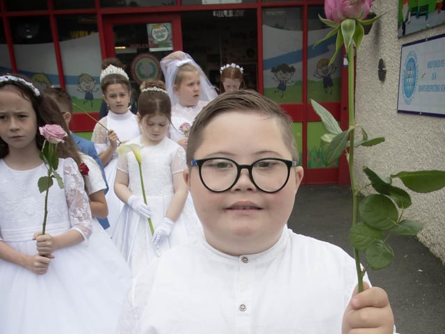 P4 pupil Ollie - all ready for Thurday's May Procession at Holy Child PS.