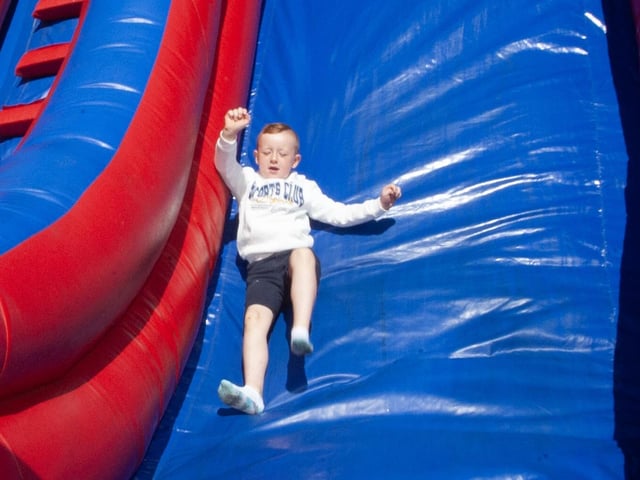 Having a go on the slide at the Big Bog BBQ.